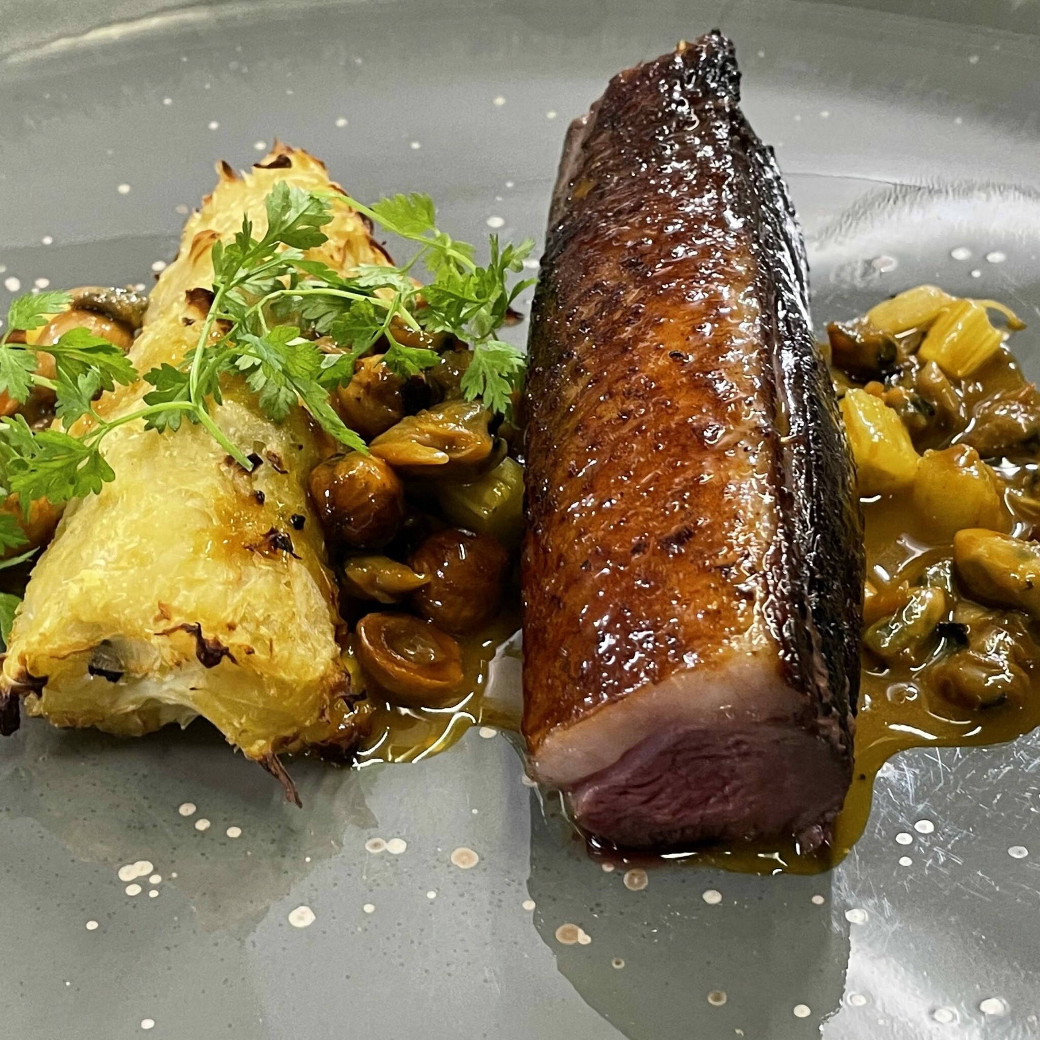 une garniture d efenouil à la mandarine et aux coques pour un pavé de magret de canard