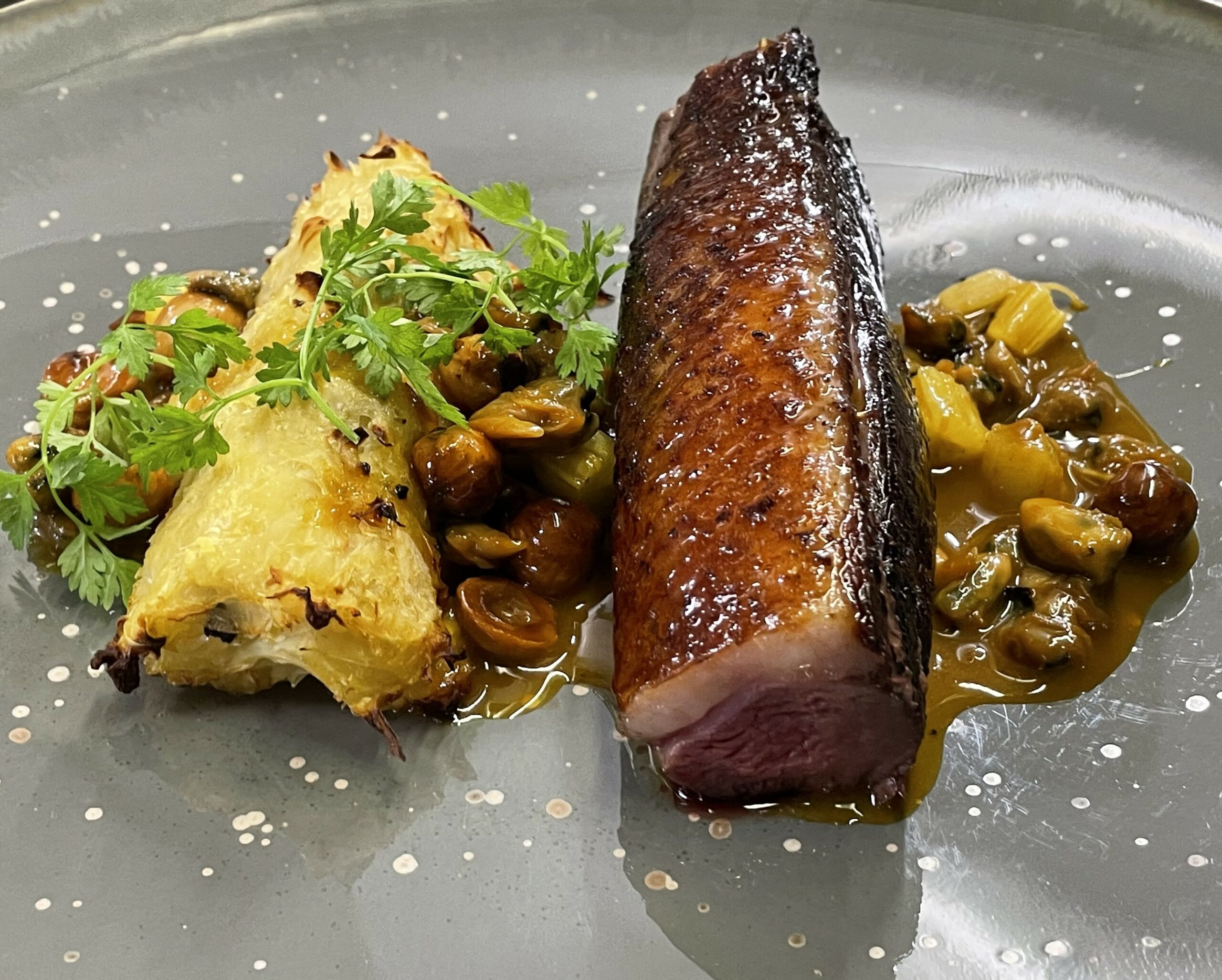 une garniture d efenouil à la mandarine et aux coques pour un pavé de magret de canard